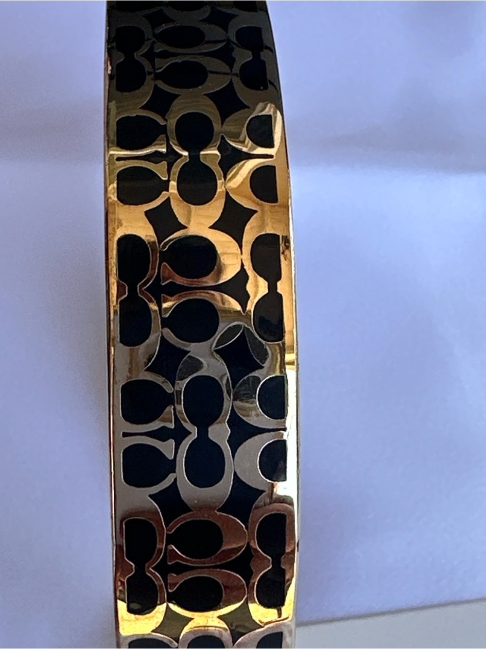 Coach Gold-Tone Watch Bracelet with Black Signature Pattern